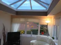 living room with skylight