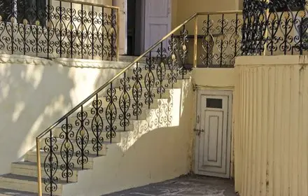 Old style railing painted black and gold.
